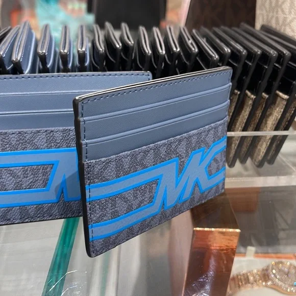 Michael Kors Cooper Graphic Logo Tall Card Case Denim Multi 36S3LCOD2B
NWT - Picture 11 of 16